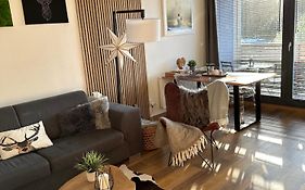 U jelena Harrachov - rodinný apartmán u lesa s garáží